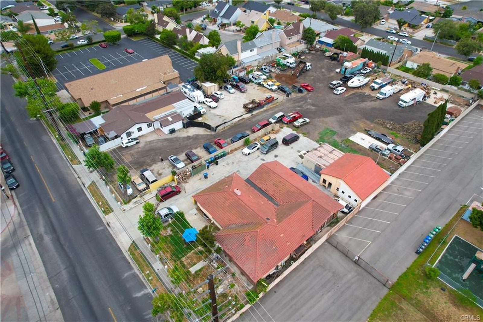803 S Sullivan St — aerial view of the 1.45-acre parcel and surrounding neighborhood