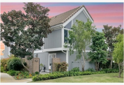 16143 Saint Croix — front elevation of the Seagate residence at twilight framed by mature trees