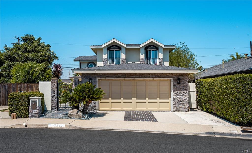 2342 Cynthia Ct — custom two-story front exterior at the end of the cul-de-sac
