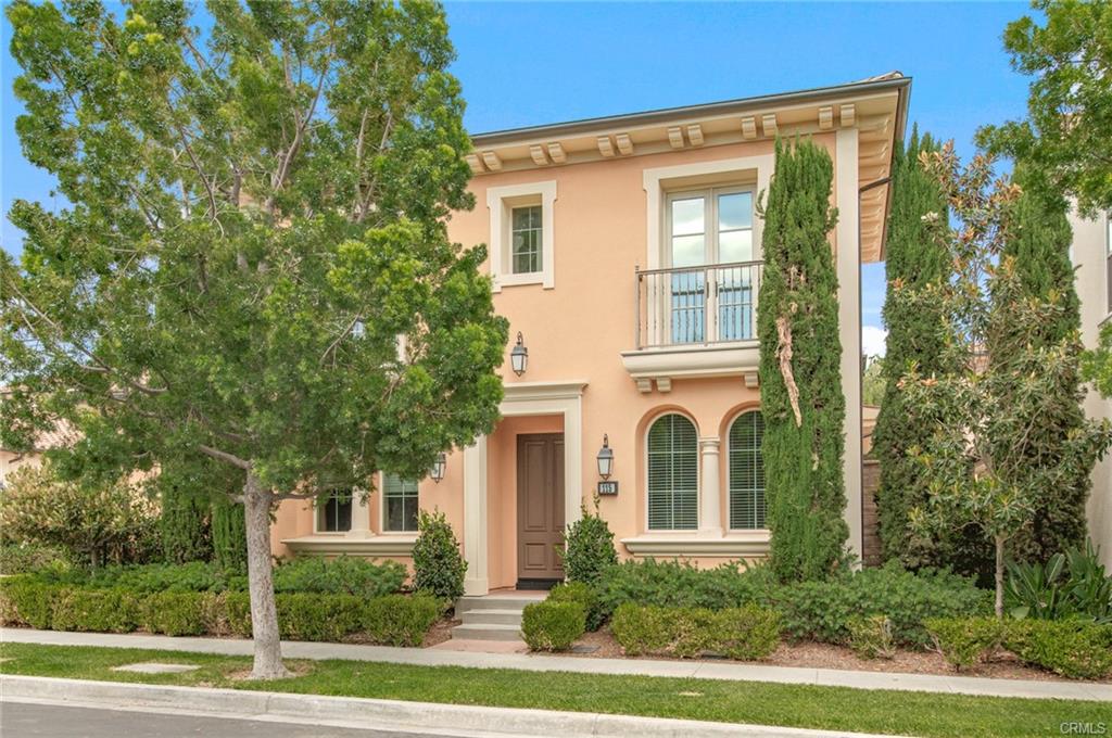115 Mustang — front elevation with arched entry and cypress trees