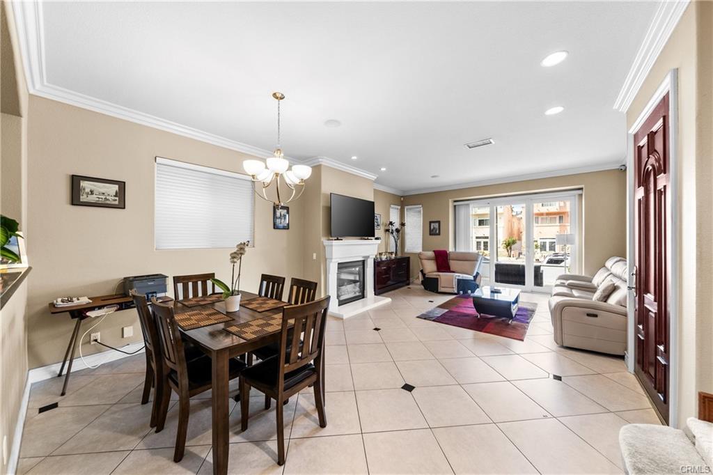 116 11th St — Formal dining area open to the living room and entry staircase