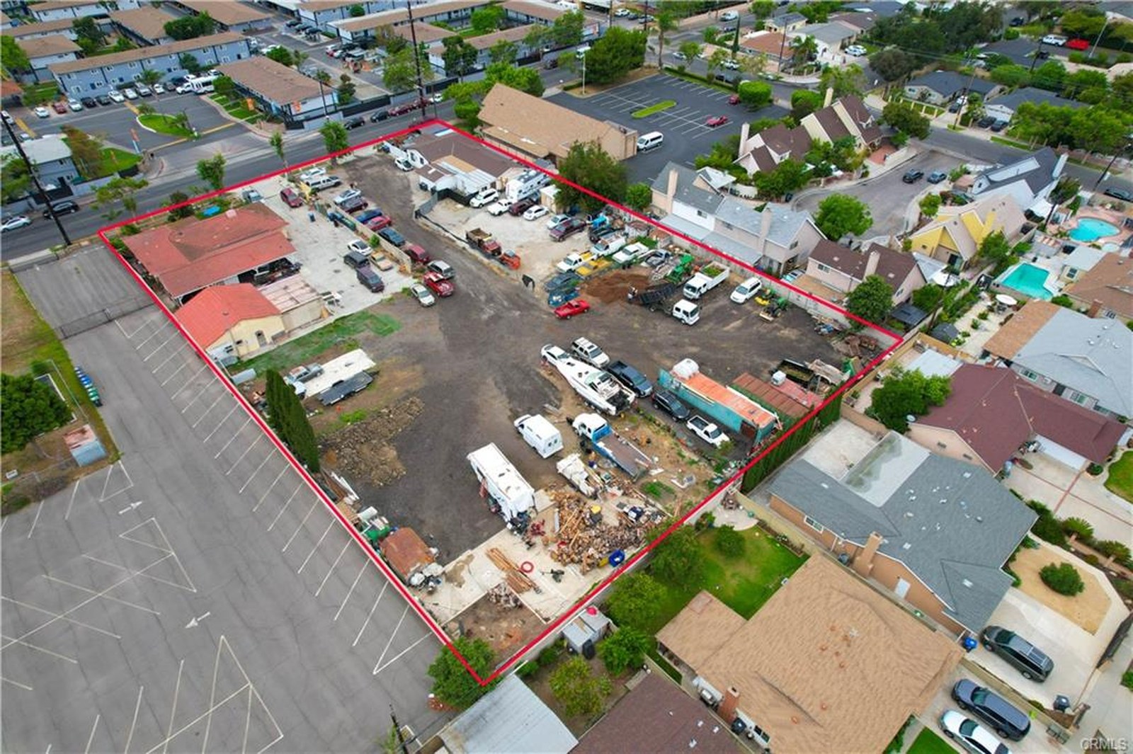 803 S Sullivan St — aerial with the property boundary outlined in red