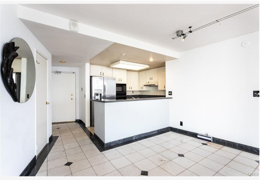 700 E Ocean Blvd #2308 — kitchen open to the dining and living area
