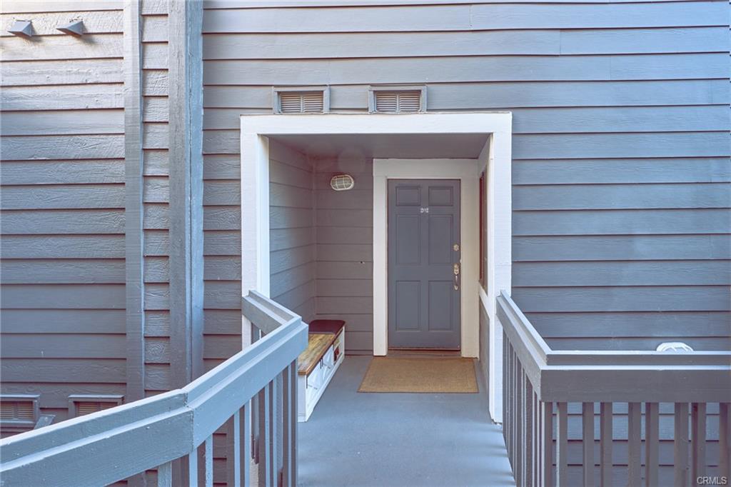 8132 Atwater Cir #202 — private entry to the upper-level residence