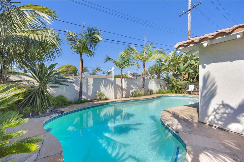 9112 Playa Dr — private pool and pool house in the rear yard